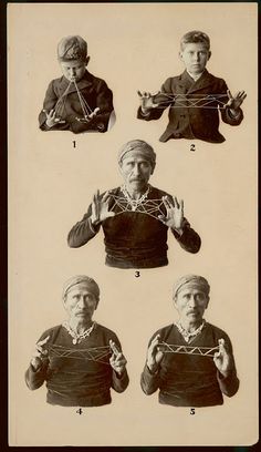 an old black and white photo shows four different people with their hands tied in chains