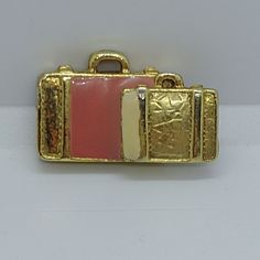 Vintage funny brooch in the shape of a suitcase.A good gift for a geography teacher and travel lovers. Add this vintage  brooch to your jeans jackets,t-shirts, hats, totes more.  A great Christmas gift for mom, wife or girlfriend. Size 1.5 cm x 2.5 cm          0.4 in x 1 in I'm always happy to combine multiple items to save on shipping,just ask! Vintage Enamel Brooch Pin For Anniversary, Antique Enamel Brooches As Gift, Retro Enamel Brooches As Gift, Geography Teacher, Vintage Suitcase Jewelry Holder, Vintage Gold Enamel Brooches, Christmas Gift For Mom, Cat Brooch, Crystal Brooch