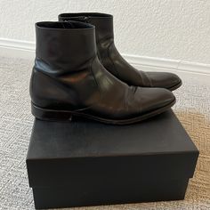 Beautiful Mens Saint Laurent Boots. Size 45 1/2 Which Is A 12.5 In Us. Black Leather. Have Zippers On The Inside. Comes With The Original Box. See Flaws On Toe Tips, Bottom Of The Shoe From Normal Wear And Heel Of The Right Shoe Very Minor And Not Noticeable. Authentic. Ysl Wyatt Boot Men Outfit, Saint Laurent Boots Men Outfit, Luxury Men's Snip Toe Heeled Boots, Luxury Black Heeled Boots For Men, Mens Saint Laurent, Saint Laurent Chelsea Boots Men, Saint Laurent Boots, Saint Laurent Shoes, Shoes Men