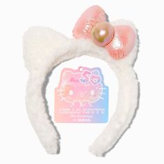 Do you love Hello Kitty®? We know we do! Wear her everywhere with this character-inspired headband. The plush headband offers a Hello Kitty® ears and bow design. You can look just like her!Headband by Hello Kitty® Claire's ExclusiveMaterial: Polyester - Hello Kitty® 50th Anniversary Claire's Exclusive Plush Cat Ears Headband Hello Kitty Headband, Stitch Room, Kitty Headband, Plush Headband, Crown Hair Clip, Hello Kitty Shop, Sensitive Ears Earrings, Dr Wardrobe, Claire's Accessories