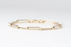 "♥ 8\" 14K Gold Large Paperclip Link Bracelet 6.89g  ♥ Each link measures 22.2x5.8mm ♥ Material: 14K gold ♥ Free US shipping. ♥ This is an in-stock item and ready to ship right away! ▶▶ Sign up for our newsletter to receive a 10% off coupon for purchases from our website: https://www.auroradesigner.com/pages/newsletter-sign-up" 14k Gold Oval Link Jewelry With Box Clasp, White Gold Link Bracelet For Anniversary, Modern 14k Gold Jewelry With Box Clasp, Timeless Yellow Gold Paperclip Bracelet As Gift, Timeless Yellow Gold Paperclip Bracelet Gift, Anniversary Jewelry With Rectangular Links And Polished Finish, Classic Formal Paperclip Bracelet With Polished Finish, Formal Yellow Gold Paperclip Bracelet With Box Chain, Yellow Gold Jewelry With Rectangular Links For Anniversary