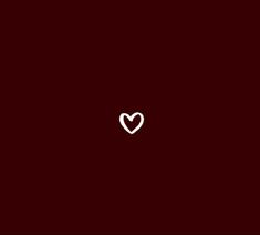 a white heart on a dark red background