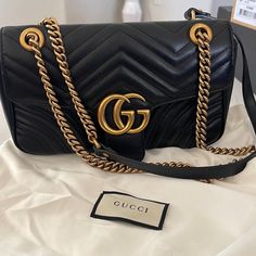 Gucci Gg Marmont Small Shoulder Bag, Black Leather, Only Been Carried Handful Of Times. I Don’t Have The Box For It Only The Duster. No Scratches. 100% Authentic Elegant Gucci Bag With Gold-tone Logo Plaque, Gucci Rectangular Bag With Gold-tone Logo Plaque, Gucci Rectangular Shoulder Bag With Gold-tone Logo, Luxury Gucci Bag With Gold-tone Logo Plaque, Designer Gucci Gold Bags, Gold Gucci Bag With Original Box, Luxury Gucci Shoulder Bag With Original Box, Gucci Black Bag As Gift, Black Gucci Bag As Gift