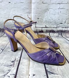 "Original 1970s Vintage Bruno Magli Purple Heels UK 5.5/EUR 38.5 Stunning vintage heels from luxe designer Bruno Magli of Italy. Very pretty purple leather uppers with peep toes and gathered detail and dainty ankle strap with small side buckle. Finished with a thick block heel. Sole measures approx 10\" x 3\" and heel approx 3.5\" high. Marked as Vero Cuoio meaning 'real leather'. These are beautiful glamorous vintage shoes and have been well worn but are still in very good vintage condition. Fa Retro Square Toe Heels For Evening, Retro Heels With Heel Strap And Square Toe, Retro High Heel Heels For Vintage Fashion, Retro High Heels For Vintage Fashion, Vintage Heels With Heel Strap For Spring, Vintage Ankle Strap Heels With 4-inch Heel, Vintage Heels With Padded Heel For Spring, Vintage Sandals With Padded Block Heel, Vintage Heels With Sculpted Heel For Spring