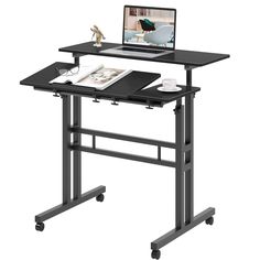 a computer desk with a laptop on it