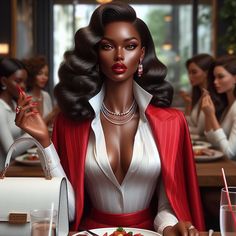 a woman sitting at a table with a plate of food in front of her