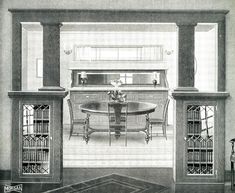 an old black and white photo of a dining room with table, bookshelves and chairs