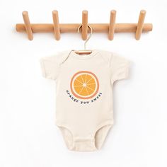 The perfect bodysuit for your perfect baby! These short sleeve bodysuits have 3 snap closure and double needle ribbed binding on neck, shoulders, sleeves, and leg openings. Machine wash cold, inside out. Air dry or tumble dry low. Sweet Cotton Onesie For Playtime, Cute Orange Cotton Onesie, Playful Orange Cotton Onesie, Citrus Party, Watermelon Baby, One Piece Clothing, Retro Baby, Gerber Baby, Hudson Baby