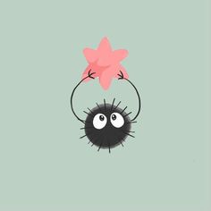 a spider with a pink flower on its head and two eyes looking at the viewer