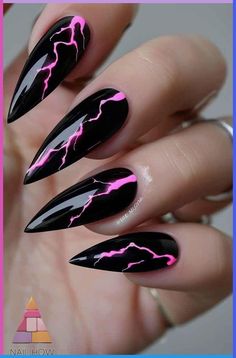 If you are doing something special for Valentine’s Day, why not decorate your nails with Valentine’s day nail art? Nail designs for Valentine’s Day usually include hearts or roses, and traditional Valentine’s Day colors, like pink, red and white. This post lists 30 ideas for Valentine’s Day Nails. Trendy, short designs, simple, gel, acrylic, pink, square, french tip, black, acrylic coffin, pink and red, short almond, simple Black With Color Nails, Black Nails Pink Design, Metallica Nails Design, Lightning Nails Designs, Pink Nails With Black Design, Black Sparkle Nails Acrylic, Lightening Nails, Black And Pink Nail Designs, Lightning Nail Art