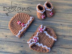 two crocheted baby booties and one hat on a wooden floor with the words designs written below it