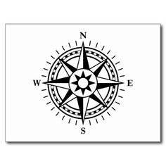 a black and white compass sticker with the word w n e s on it