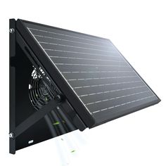 a solar panel mounted on the side of a wall with a fan attached to it