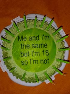 a cake that has been decorated to look like a sunflower with words on it