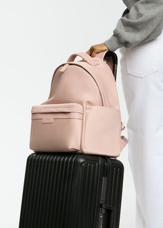 Crafted from our high-quality nylon and designed with ample storage space, the Eli backpack boasts a modern, minimalist design that complements various styles. A dedicated compartment for a 13" laptop, multiple pockets, and organizational features make it ideal for both work and play. Whether you're heading to the office, school, or a weekend adventure with your littles, Eli is the perfect companion. Common Uses: Diaper Bag, Work Bag, Travel Bag Disclaimer: Please note that colors may appear dif Modern Nylon Backpack Travel Bag, Modern Nylon Backpack With Large Capacity, Modern Large Capacity Nylon Backpack, Nylon Laptop Backpack With Luggage Sleeve, Modern Nylon Backpack Luggage, Nylon Laptop Backpack With Large Capacity, Nylon Laptop Bag Backpack With Large Capacity, Nylon Laptop Bag With Large Capacity, Nylon Backpack With Luggage Sleeve