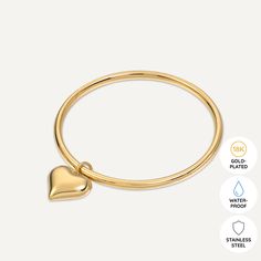 Celebrate love and connection with the Heartfelt Charm Fixed Bracelet. This delightful piece features a smooth, heart-shaped charm that dangles gracefully from a sleek, gold-plated band. Crafted with 18K gold-plated material, this bracelet is water-proof, tarnish-free, and hypoallergenic, making it a durable and heartfelt addition to your jewelry collection. Whether worn solo or layered, this bracelet radiates warmth and affection, perfect for expressing your inner romantic. Product Code: DB2194K Collection: Vibes Type: Fixed Size Material: 18K Gold-Plated Stainless Steel Dimensions: Diameter 7cm Pendant Dimensions: 2cm x 2cm Style: Heart, Elegant Includes: Classic Gold Charm Bracelet With Heart, Minimalist Gold Charm Bracelet With Heart, Yellow Gold Heart-shaped Minimalist Bracelet, Gold Heart Bracelet With Heart Charm For Promise, Gold Heart Charm Bracelet Classic Style, Gold Promise Bracelets With Heart Charm, Gold Promise Bracelet With Heart Charm, Minimalist Gold Bangle Heart Bracelet, Gold Minimalist Heart Bangle Bracelet