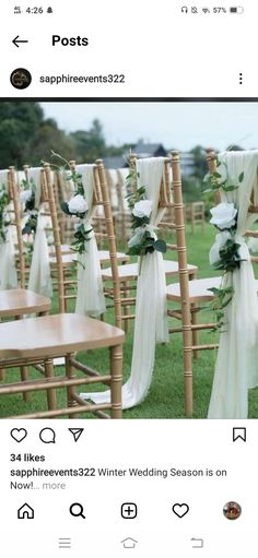 rows of wooden chairs with white sashes and flowers tied to the back of them