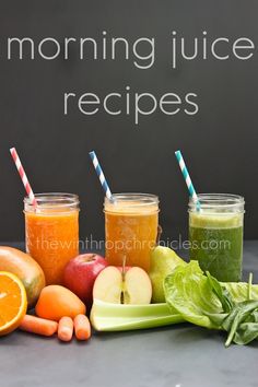 there are many different fruits and vegetables on the table with juices in jars next to each other