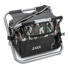 a camo - print cooler with an orange name tag on the front and back