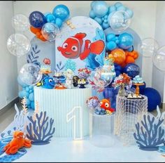 an under the sea birthday party with balloons and decorations