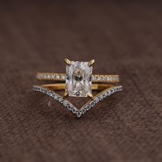 an engagement ring with a square cut diamond