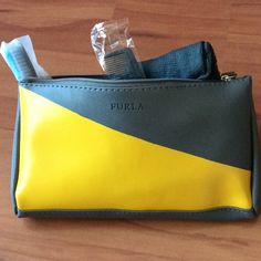 New, Never Used. A Furla Bag With Travel Size Toiletries. Including A Lotion, Lip Balm, Toothpaste & Toothbrush, Eye Shield, Socks, Ears Plugs And Comb. It Is A Complimentary Inflight Amenity Kit. All 7 Pieces And A Bag Are Yours. Size: 8” X 4 1/2” X 1/2” Yellow Travel Bag With Cell Phone Pocket, Yellow Bag With Removable Pouch For Personal Use, Yellow Rectangular Travel Pouch, Yellow Travel Bag With Zipper Pouch, Everyday Yellow Bag With Zipper Pouch, Everyday Yellow Bags With Zipper Pouch, Yellow Everyday Bag With Zipper Pouch, Yellow Zipper Pouch Cosmetic Bag For Everyday Use, Yellow Cosmetic Bag With Removable Pouch For Everyday Use