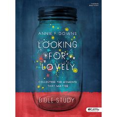 the book looking for lovely by annie f downes is shown in front of a red and blue background