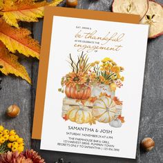 an autumn wedding card with pumpkins and flowers