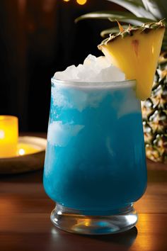 This pin features a delicious Sweet Poison Cocktail combining fruity flavors with rum, blue curacao, and pineapple juice. Perfect for cocktail lovers looking for a refreshing drink.