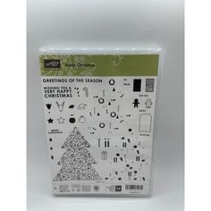 a package of christmas stamps on a white background with the words greetings of the season