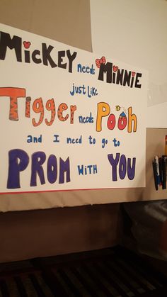 a sign that says mickey and minnie just like tiger pooh and i need to go to prom with you