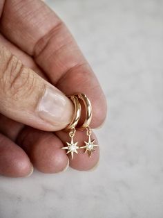 Dainty Gold Earrings, Gold Hoop Earrings, Minimalist Earrings, Gift for Her, Mother`s Day Gift, 14k Gold Filled Mini North Star CZ Hoop Huggies, Dainty Delicate Earrings, Simple Boho Layering Earrings, Bridal Best Friend Girlfriend GiftA tiny pair of endless hoop huggies featuring a tiny CZ North Star charm. Delicate earrings with a lot of style. It's simplicity brings an effortless bohemian glam - perfect for everyday styling!>>>>>>>>>>>>>>>>>& Layering Earrings, Kids Jewellery, Dainty Gold Earrings, Star Charm Necklace, Boho Layering, Earring Ideas, Mini Hoop Earrings, Paris Outfits, Earrings Simple