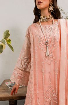 Luxury Embroidered Peach Pakistani Salwar Kameez Salwar Dupatta Suit is a breathtaking attire adorned with Hand-crafted details of sequins, Sitara, Stones, and Motifs. Embroidery and intricate designs make this beautiful Pakistani Dress an epitome of beauty and your foremost priority. Pakistani Kameez: Pakistani kameez is emblazoned with graceful embroidery work and motifs. This kameez is adorned with hand-crafted details of stones and sequins. The fabric of this kameez is premium chiffon. Intri Islamic Modesty, Peach Parfait, Pakistani Salwar, Beautiful Pakistani Dresses, Pakistani Salwar Kameez, Fashion Consultant, Pakistani Dresses, Salwar Kameez, Formal Wear