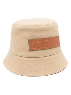 sand beige cotton/canvas flat crown logo patch to the front dropped narrow brim full lining This piece comes complete with a protective dust bag. This item is in size 58 and the color is Brown Designer Beige Flat Brim Hat, Beige Hat With Embroidered Logo And Short Brim, Beige Wide Brim Canvas Hat, Beige Canvas Bucket Hat, Beige Flat Brim Hat With Embroidered Logo, Beige Canvas Hat With Short Brim, Loewe Paula's Ibiza, Shopping Online Logo, Bucket Hat Women