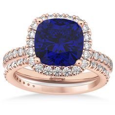 Style Number - AZ16307
Your future wife will be speechless if you propose with this stunning, sizeable, and special engagement ring.This eye-catching halo diamond ring features 0.51ct total weight of accent diamonds on the thin, 14k Rose Gold band, as well as surrounding a 2.60ct cushion cut Blue Sapphire. Cushion Cut Halo Engagement Ring, Halo Bridal Set, Cushion Cut Halo, Tanzanite Diamond, Blue Sapphire Diamond, Rose Gold Band, Future Wife, Oval Cut Diamond, Halo Diamond Ring