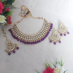 Traditional Kundan Necklace Set / Deep Purple Jewelry Set Size: Free Color: Deep Purple Plating: Gold Finish Stone: Kundan Packing: Set Includes Matching Earrings and Maang Tikka As per Etsy guidelines as of July 01, 2022, GST/HST needs to be included in Pricing for customers in Canada, hence price for Canadian customers includes GST/HST. Provincial taxes apply separately by Etsy wherever applicable in Canada. We offer free shipping. We keep fair pricing considering inflated cost of shipping wit Purple Kundan Necklace For Gifting, Purple Kundan Jewelry Gift, Purple Kundan Necklace Gift, Traditional Purple Jewelry For Party, Purple Jewelry For Festivals And Celebrations, Purple Necklaces For Festivals And Gifts, Purple Jewelry Set, Earrings Party Wear, Indian Jewelry Earrings