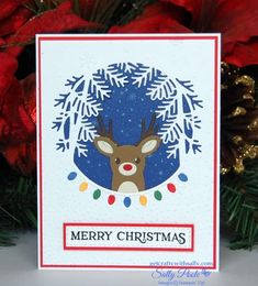 a christmas card with a reindeer head and snowflakes on the bottom, surrounded by red poinsettis