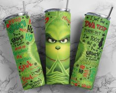 the grin face is on three green tumblers with words written in different languages and phrases