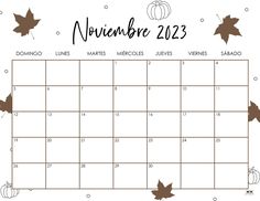 a november calendar with autumn leaves and pumpkins on the page, which is written in spanish