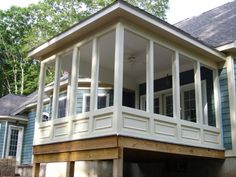 a large house with lots of windows and siding