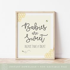 a framed sign that says babies are sweet please have a treat on the front and back