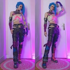 a woman with blue hair is standing in front of two doors and wearing purple pants