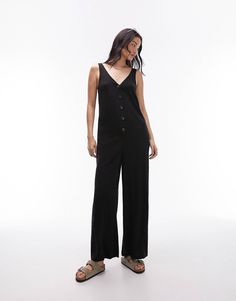 Topshop v neck button down knotted strap jumpsuit in black | ASOS Summer V-neck Jumpsuits And Rompers With Buttons, Spring V-neck Jumpsuits And Rompers With Buttons, Chic V-neck Jumpsuits And Rompers With Button Closure, Chic V-neck Jumpsuits And Rompers With Buttons, Casual V-neck Jumpsuits And Rompers With Button Closure, Spring Loungewear Jumpsuits And Rompers With Buttons, Casual V-neck Jumpsuit With Button Closure, Black Button-up Jumpsuits And Rompers For Summer, Summer Button Closure Jumpsuits And Rompers For Loungewear