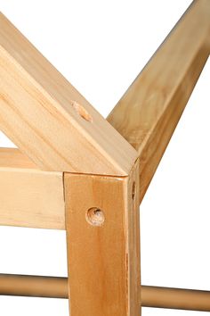 a close up of a wooden bench frame