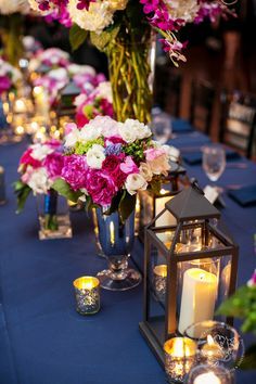 an image of a table with flowers and candles for a wedding or special event on instagram