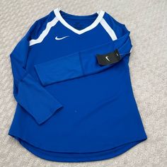 Never Worn Nike Top Unisex Check Out All My Items Bundle And Save. Send Me An Offer. Purchase As Much As You Want And Get A Discount And Pay Only One Shipping Fee!!! Blue Sporty Tops For Tennis, Sporty Blue Tennis Tops, Nike Stretch Tops For Sports, Sporty Blue Tops For Cheerleading, Moisture-wicking Tennis Sportswear Tops, Moisture-wicking Tennis Tops, Blue Casual Tennis Top, School Spirit Sports Top With Moisture-wicking, Best Soccer Cleats