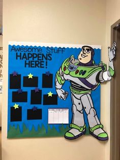 a bulletin board with an image of buzz lightyear from toy story books on it