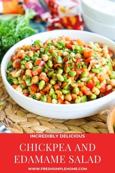 chickpea and edama salad in a white bowl on a woven place mat