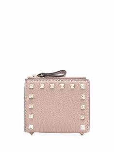 Powder pink/gold-tone leather Rockstud bi-fold wallet from VALENTINO GARAVANI featuring grained texture, gold-tone Rockstud detailing, gold-tone logo lettering, bi-fold design, internal card slots, internal zip pocket and internal logo stamp. Valentino Wallet, Valentino Rockstud, Logo Stamp, Powder Pink, Gold Texture, Valentino Garavani, Purse Wallet, Trekking, Pink And Gold