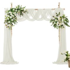 an arch decorated with flowers and greenery on a white background for a wedding ceremony